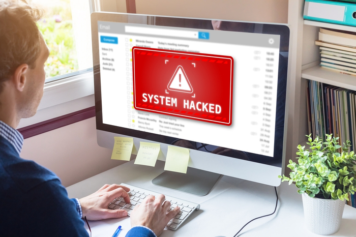 PC mit "System Hacked"