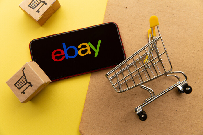 Ebay Symbol mit kleinen Boxen und Einkaufswagen