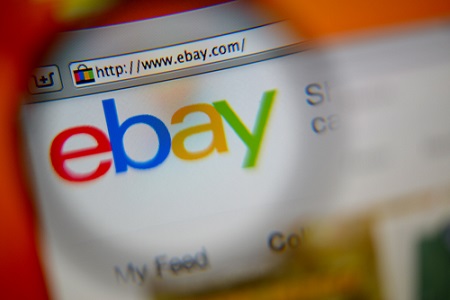 Lupe über Ebay-Logo auf der Website