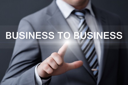 business, technology, internet and b2b concept - businessman pressing business to business button on virtual screens