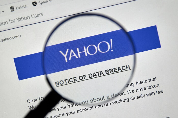 Yahoo Notice of newly discovered data breach under magnifying glass.